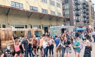 Fans gather in front of the Nautical Bowls food truck.