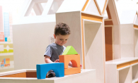 A child plays with blocks in the play area at Ridgedale Center.