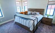 A golden retriever using a Doggie Bunk Bed