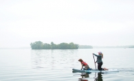 paddleboarding with a dog