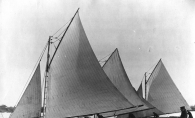 In this historical photo, a group of ice boats sail on Lake Minnetonka.