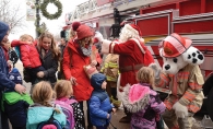 Kids meet the Excelsior Fire District mascot Sparky at a free family movie event.