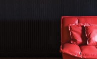 A red couch at The Freight Room, the music venue connected to The Depot Coffee House