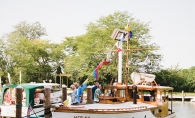 Real Runabouts Rendezvous A wooden boat at the Real Runabouts Rendezvous, an event hosted by the Bob Speltz Land-O-Lakes chapter of the Antique and Classic Boat Club.