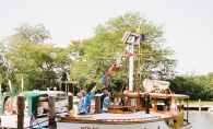 A wooden boat at the Real Runabouts Rendezvous, an event hosted by the Bob Speltz Land-O-Lakes chapter of the Antique and Classic Boat Club.