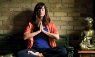 Nicole Lovald, owner of Spirit of the Lake Yoga and Wellness Center, meditates