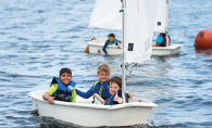 Kids sailing at a Lake Minnetonka summer camp.