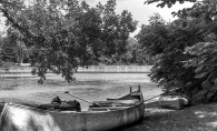 A black and white photo of a canoe set to launch on Gray's Bay on Lake Minnetonka.