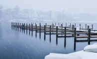 The aftermath of a spring blizzard on a dock on Lake Minnetonka.