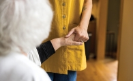 Cori Levin with two elderly clients.