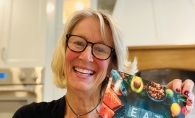 Lisa Patrin holding her book 'Eat Your Words'