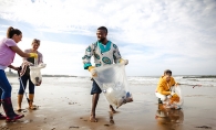 Volunteers clean up a beach