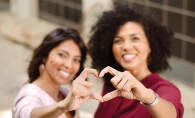 Two women at The Pink Social, an event benefiting breast cancer research.