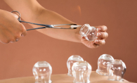 Heated glass containers are placed on a person's back in a practice known as cupping.