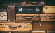 stack of vintage hard-sided luggage