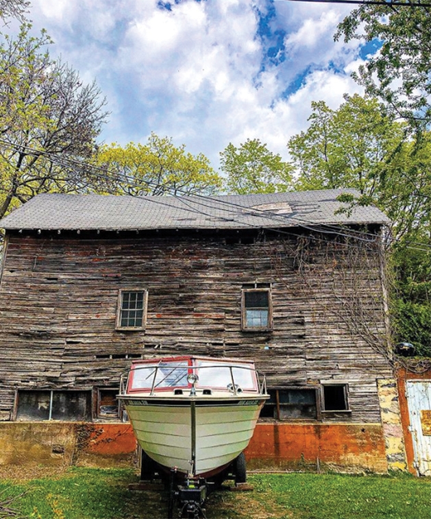 A boat sits outside a lakehouse in Excelsior, Minnesota.