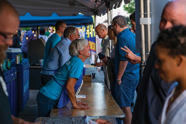 A vendor takes a man's order at James J. Hill Days 2019.