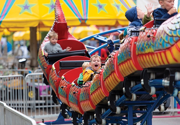 Children ride the roller coaster at James J. Hill Days 2019.