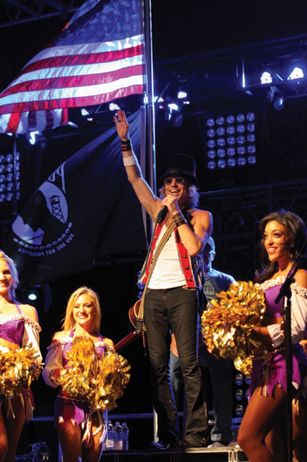 Vikings cheerleaders performing with country artist Big Kenny from Big & Rich