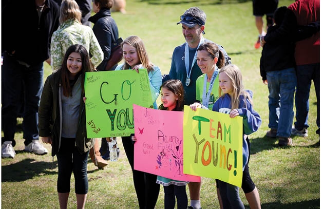 Julie and Steve Young with their cheering team “Team Young” 