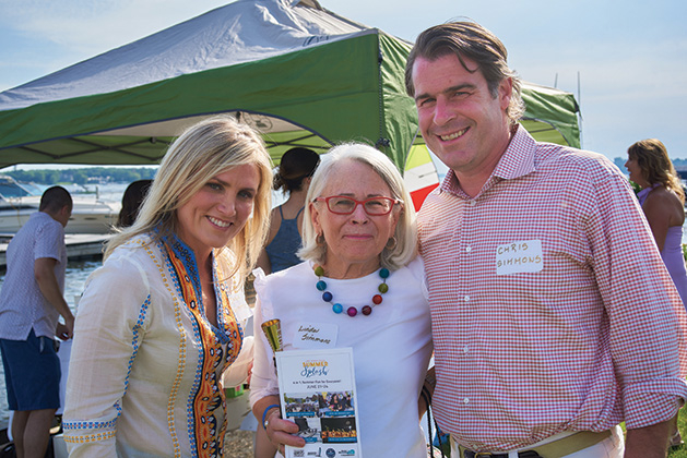 Attendees at Wine on Wayzata Bay pose for a photo.