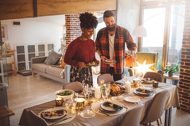 A couple celebrates New Year's Eve at home