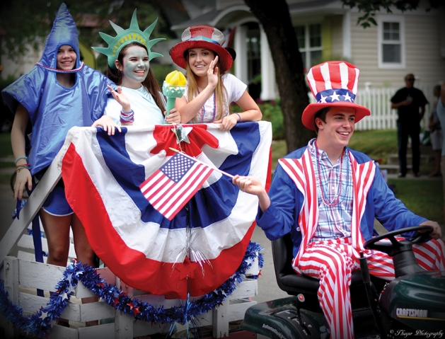 Young adults dressed up for a Fourth of July parade