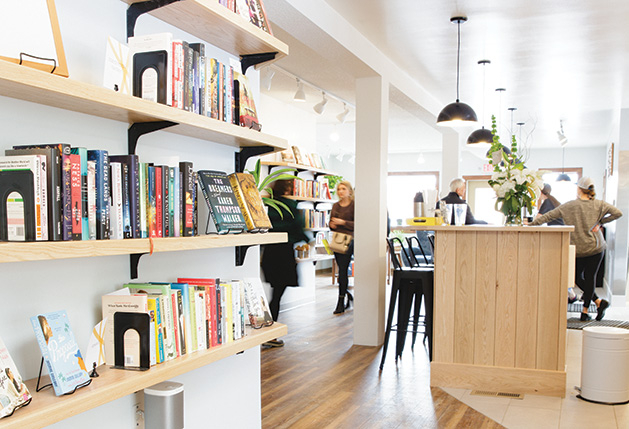 Cream & Amber The bookshelves and community space at Cream & Amber, a Hopkins store offering books, beer, coffee and more.