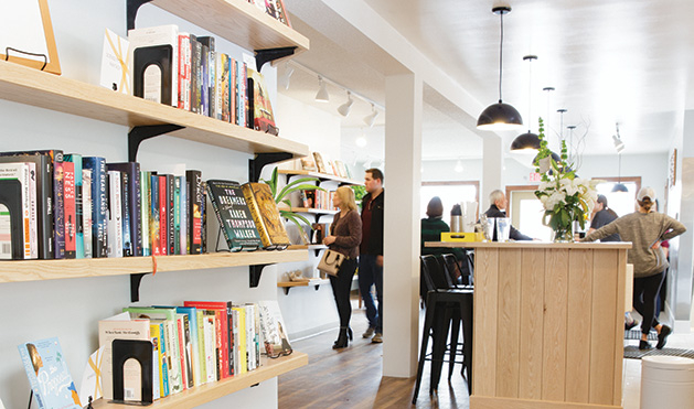 Cream & Amber The bookshelves and bar at Cream & Amber, a new bookstore/taproom/coffee shop in Hopkins.
