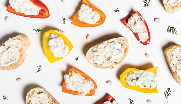 Darling Pickle Dips Bread and peppers covered in dips from Darling Pickle Dips