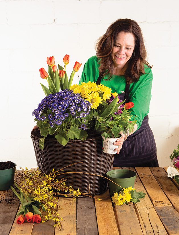 Lynn Messman of Gardens by Lynn Minnetonka decorates a container garden