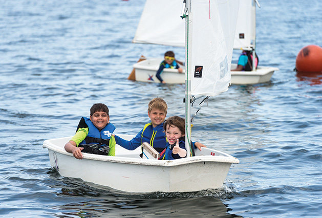 Kids sailing at a Lake Minnetonka summer camp.