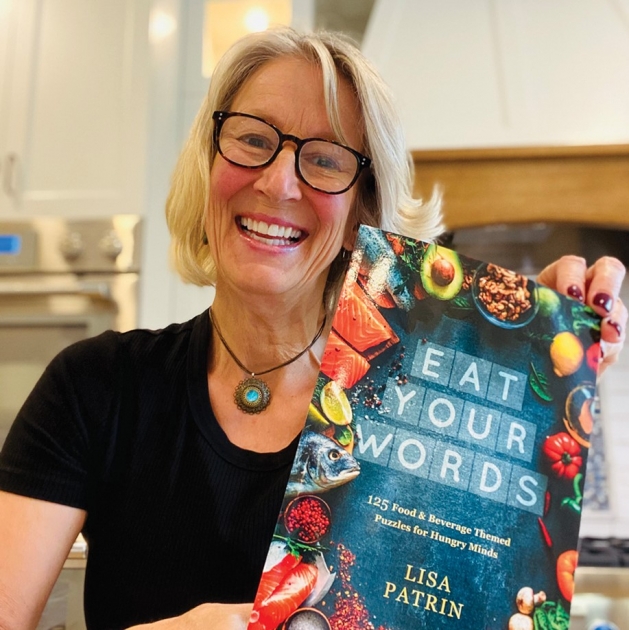 Lisa Patrin holding her book 'Eat Your Words'