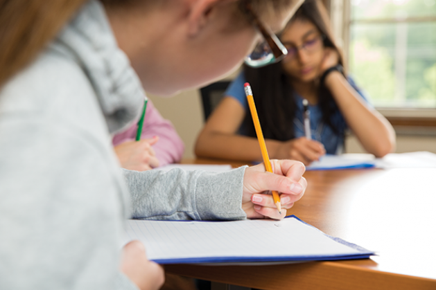 Teenagers writing