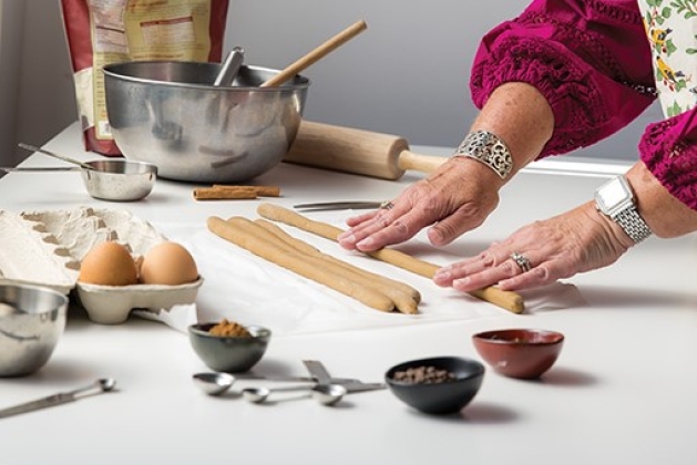 Advisory board member Laura Bray making traditional German Pfeffernüsse cookies.