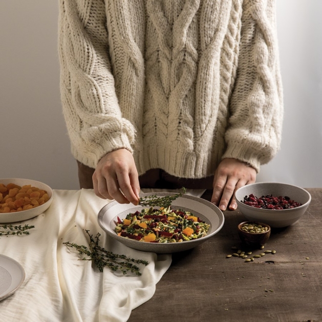 Garnishing a side dish.