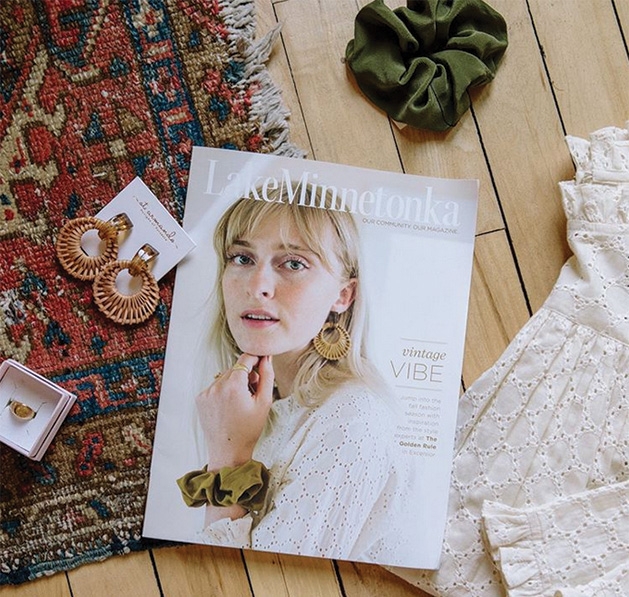 A copy of the September 2019 issue of Lake Minnetonka Magazine sits on the floor of The Golden Rule gallery.