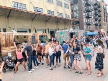 Fans gather in front of the Nautical Bowls food truck.