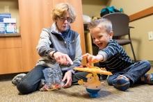 child playing on floor