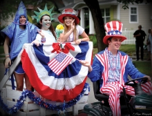 Young adults dressed up for a Fourth of July parade