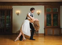 A couple practices their first dance at Tulle Tuxedo