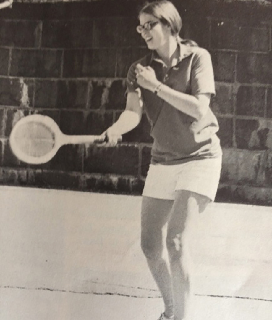 Peggy Brenden playing tennis. (Photo was originally printed in her school newspaper.)