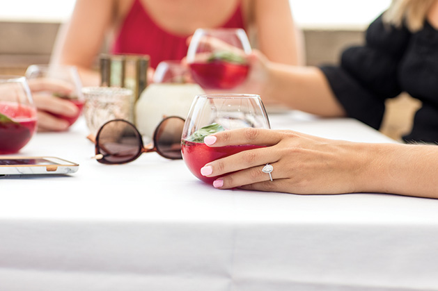 Women enjoy cocktails from 6Smith during a bachelorette party.