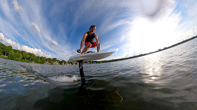A man surfs on Lake Minnetonka